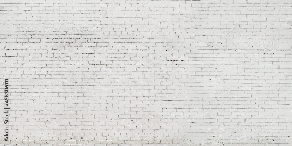 Background of an old brick white painted wall Background of an old brick white painted wall