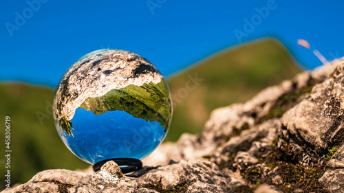 Crystal ball alpine landscape shot at the famous Fellhorn summit near Oberstdorf, Bavaria, Germany