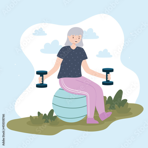 grandmother with weight and fitball