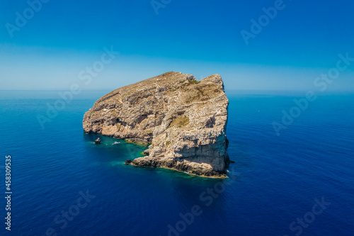 Aerial view of Isola di Foradada island in Alghero district in Sardinia. photo