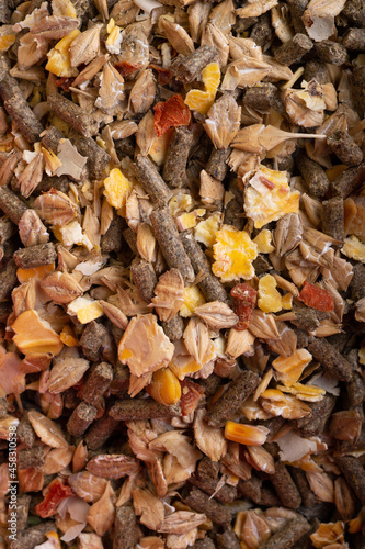 background of special nutrition muesli for horses. feeding and horse care concept. macro. top view