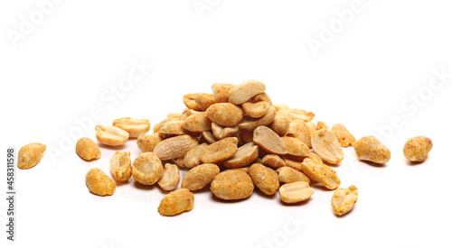 Spicy hot, dry roasted peanuts pile isolated on white background