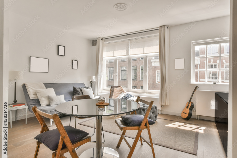 Stylish interior of living room in daytime