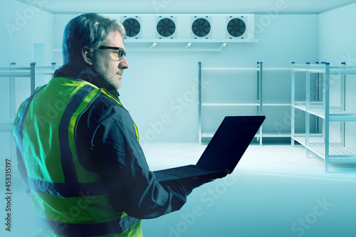 Engineer man inside refrige...