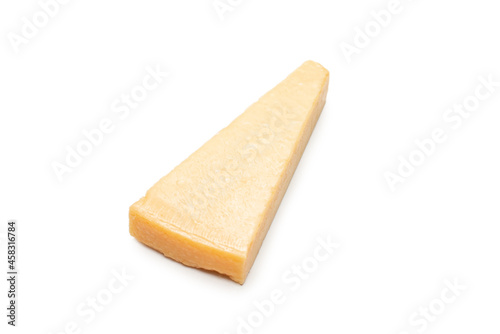 Half of parmigiano cheese isolated on a white background.