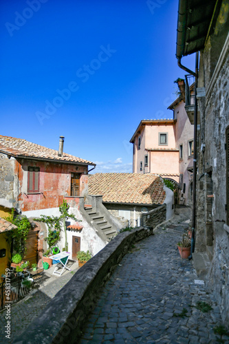 A narrow street in Anguillara sabazia, an old town in Lazio region, Italy. © Giambattista