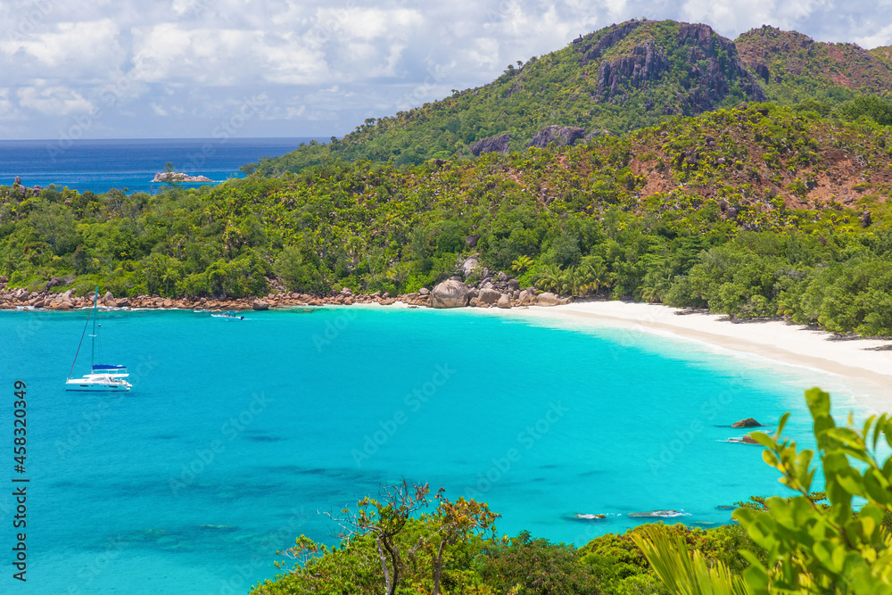 Picturesque landscape at Anse Lazio beach on Praslin island, Seychelles. View from above. Blue ocean and white sand.