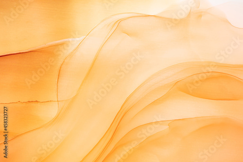 Abstract fluid art painting in alcohol ink technique. Liquid light texture that flows and forms waves color. Natural warm background. Designed for wall decoration, postcard or poster, cover design.