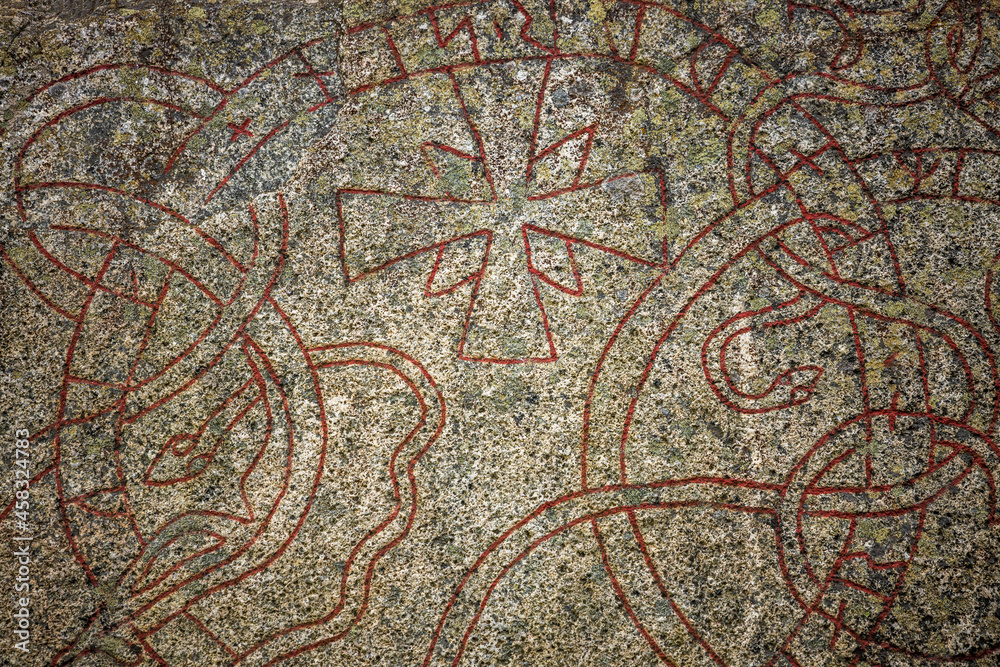 Close up view of runestone with inscription from the 1000s AD. Sweden. Close up view of runestone with inscription from the 1000s AD. Sweden.