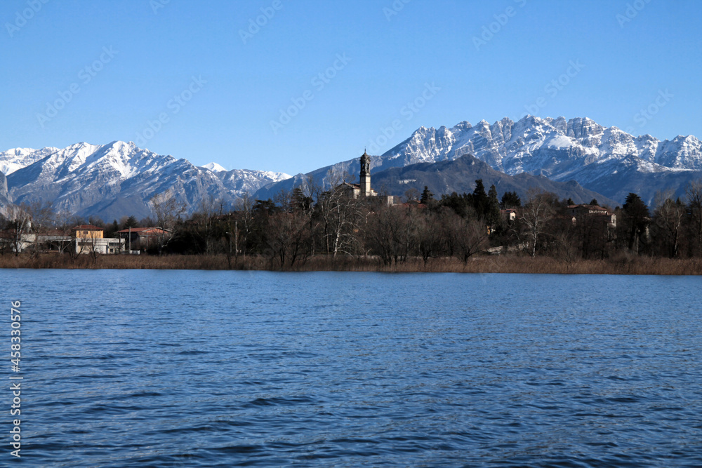 Italian lake and alps in a perfect winter scene