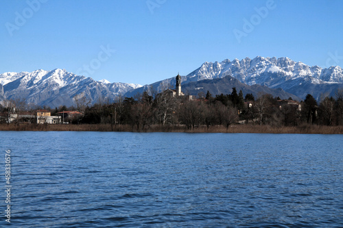 Italian lake and alps in a perfect winter scene photo