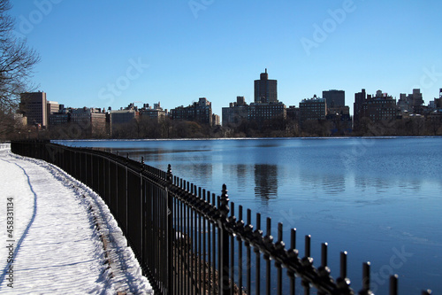Upper East Side of New York City behind the iconic reservoir in Central Park in Manhattan