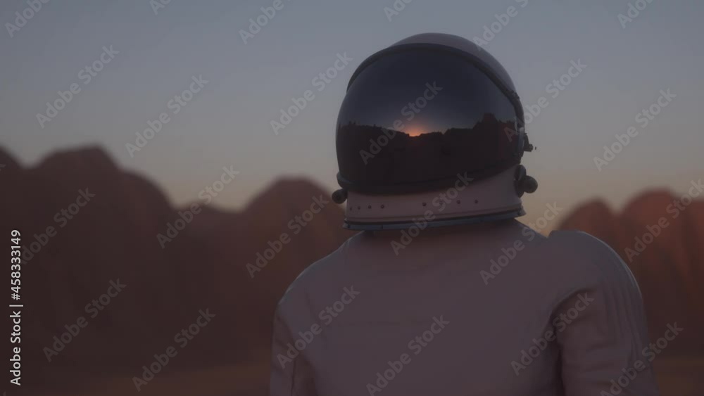 Portrait shot of the Astronaut wearing in helmet on the distant planet. Space Travel, Exploration and Solar System Colonization Concept Portrait shot of the Astronaut wearing in helmet on the distant planet. Space Travel, Exploration and Solar System Colonization Concept