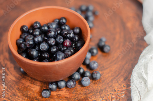 blueberries in a clay plate