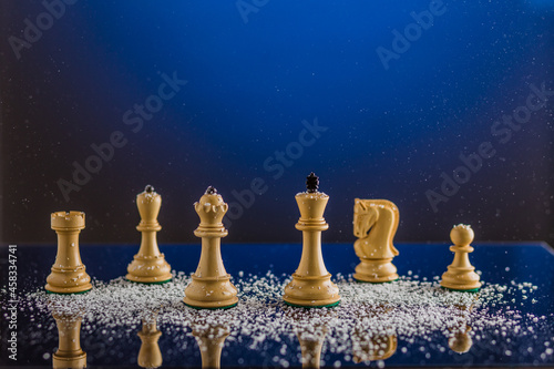 chessboard and chess pieces in a christmas or newyear postcard. strategy, intelligence board game