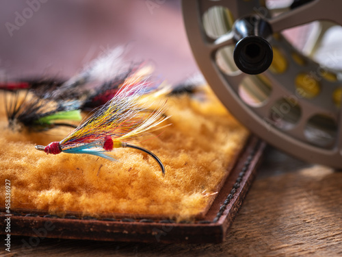 Favourite Atlantic Salmon fishing fly, Silver Doctor, in traditional leather fly fishing wallet.