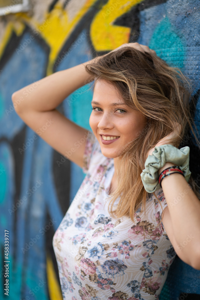Natural Looking Young Beautiful Woman with Hazel eyes posing in abandoned building, no post editing