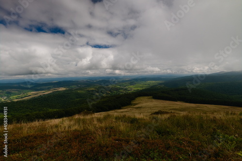 Cloudy sky over a mountain valley. Ukraine Eastern Bieszczady Carpathians.