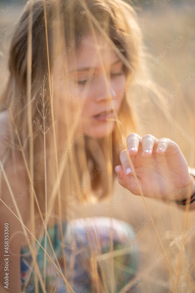 Natural Looking Young Beautiful Woman with Hazel eyes posing in the fields, no post editing Natural Looking Young Beautiful Woman with Hazel eyes posing in the fields, no post editing