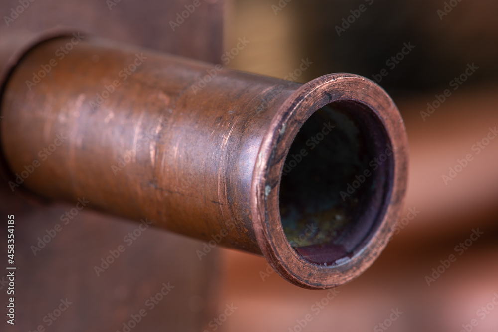 Copper pipe with water closeup installation plumbing Copper pipe with water closeup installation plumbing