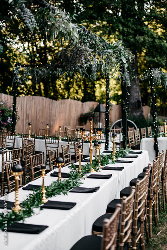 Fotografija Tables set for outdoor wedding reception