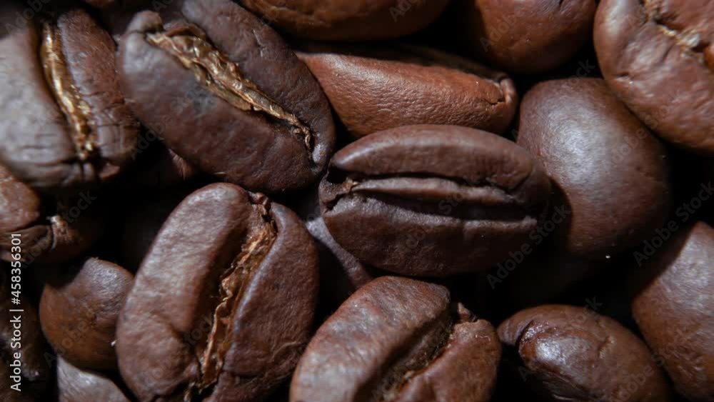 Roasted coffee. Close up of coffee seeds. Macro shoot of coffee beans.italian coffee.organic food Roasted coffee. Close up of coffee seeds. Macro shoot of coffee beans.italian coffee.organic food