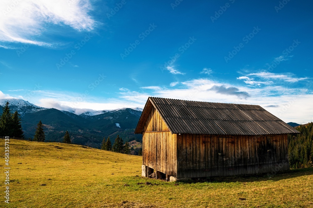 Beautiful forests covering the Carpathian mountains and a small village Beautiful forests covering the Carpathian mountains and a small village