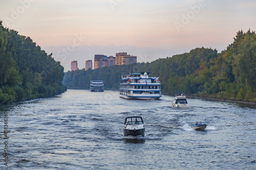 White four-deck ship Leonid Krasin on a river cruise. Built in Germany in 1989. Moscow region, Russia photo