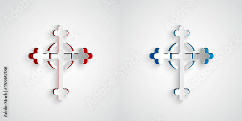 Paper cut Christian cross icon isolated on grey background. Church cross. Paper art style. Vector