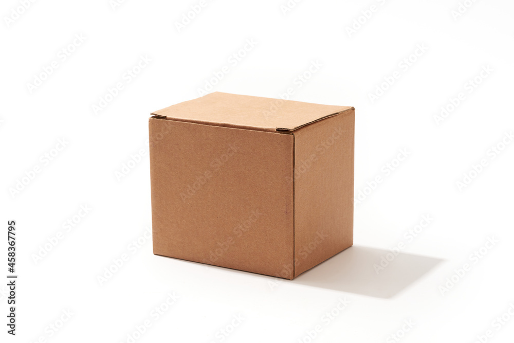 Close-up cardboard box isolated on white background Close-up cardboard box isolated on white background