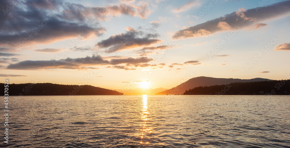 Obraz premium Canadian Nature Landscape View of the Gulf Islands on West Coast of Pacific Ocean. Dramatic Colorful Summer Sunset Located near Victoria, Vancouver Island, British Columbia, Canada.