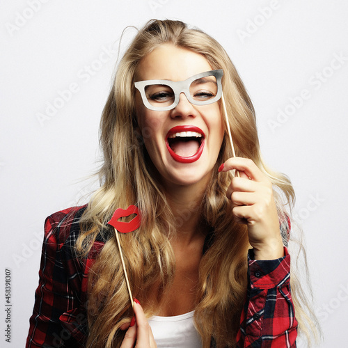 Attractive playful young woman ready for party