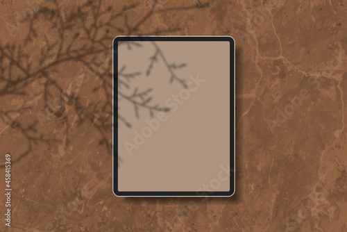 Digital tablet mockup on brown marble background vector