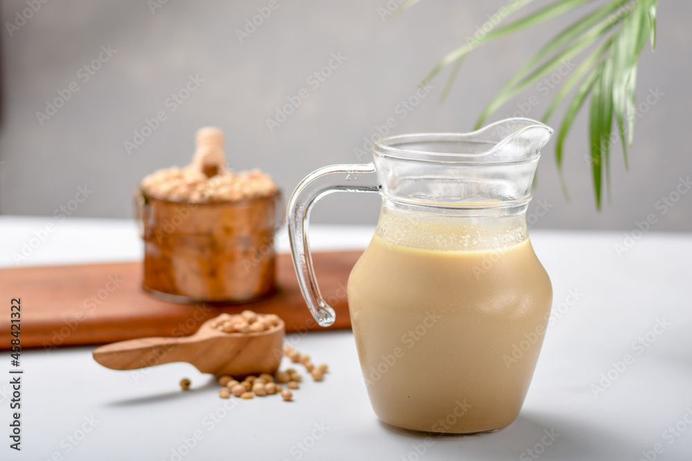Homemade Soy milk and Soybean on wooden background, Healthy drink. Homemade Soy milk and Soybean on wooden background, Healthy drink.