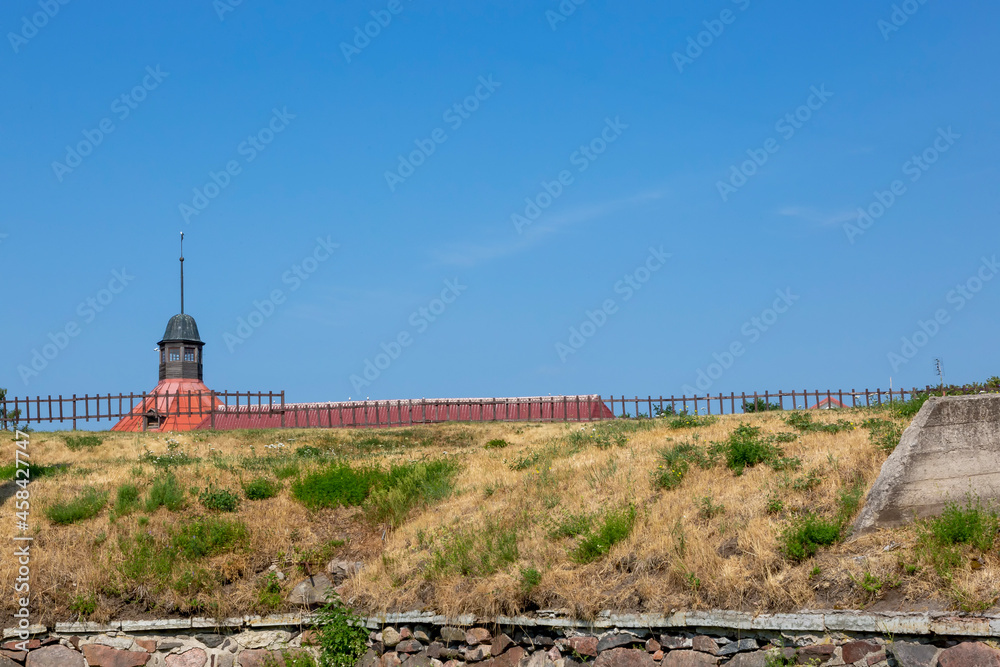 Priozersk, Russia - July 10, 2021: Tower and rampart of Korela fortress in the city of Priozersk, Leningrad region, built in XIII - XIV centuries Priozersk, Russia - July 10, 2021: Tower and rampart of Korela fortress in the city of Priozersk, Leningrad region, built in XIII - XIV centuries