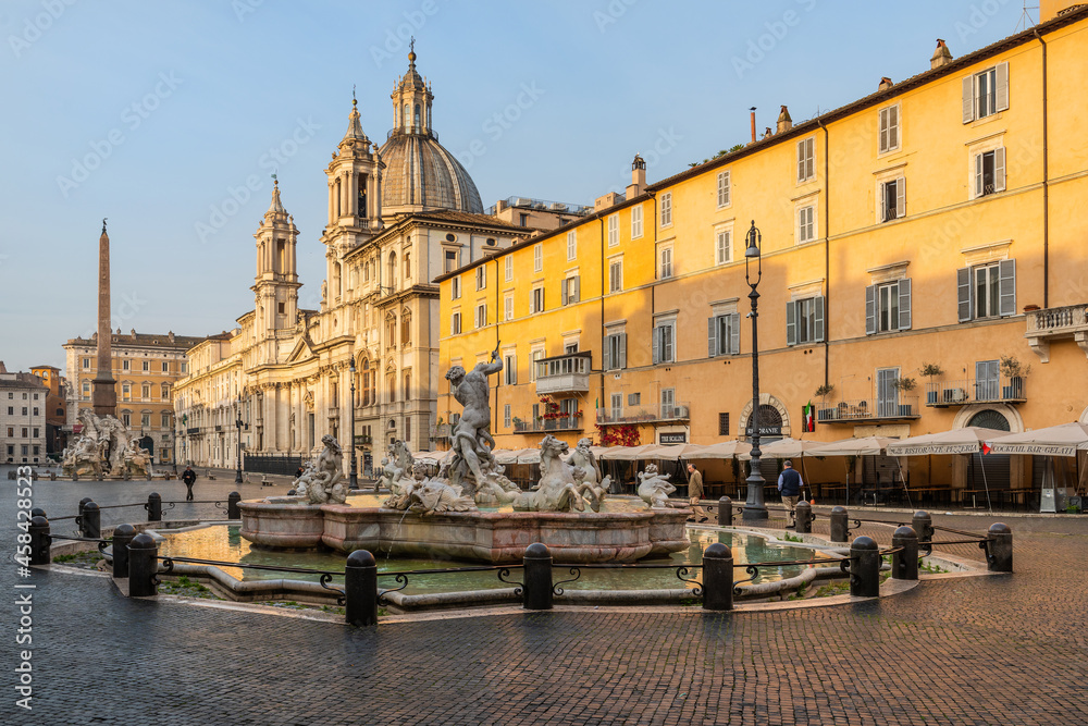 Piazza Navona, the Neptune fountain and the church of St. Agnes in the early morning