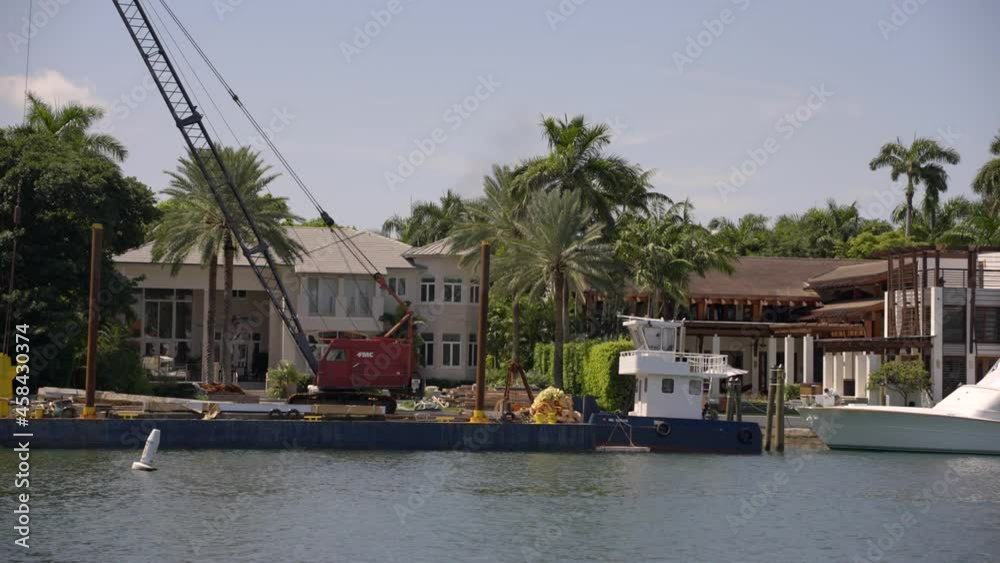 Seawall construction with barge Miami 4k video Seawall construction with barge Miami 4k video