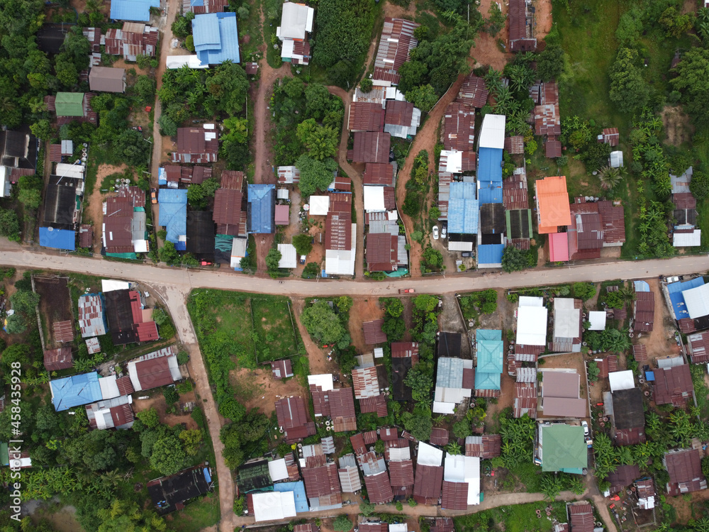 Aerial drone photograph of a residential area with a large number of houses in the countryside. Aerial drone photograph of a residential area with a large number of houses in the countryside.