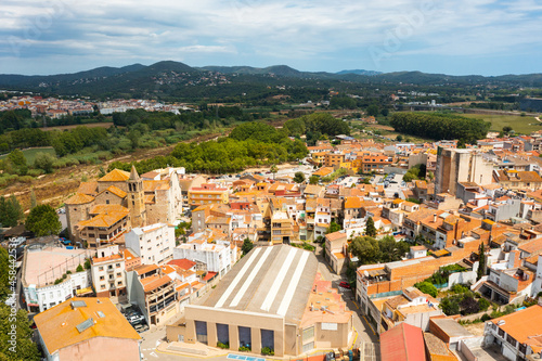Bird's eye view of Spain city Tordera with skyline in background. photo