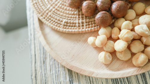 Organic Macadamia nut. macadamia nuts are cracked and baked to taste extremely delicious superfood fresh natural shelled unsalted raw macadamia and healthy food concept