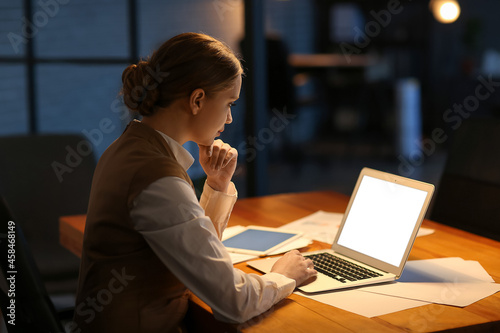 Young woman working on lapt...