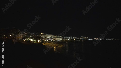 Nighlapse of Costa Adeje town and beach in Tenerife island photo