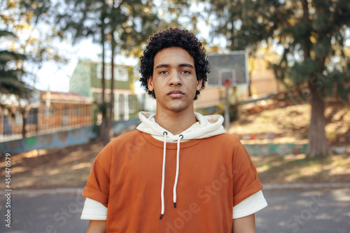 Confident male youngster looking at the camera