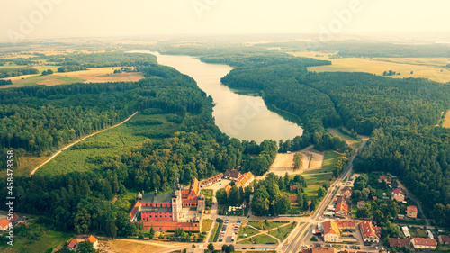 Fototapeta Naklejka Na Ścianę i Meble -  Aerial photo from drone to Swieta Lipka,Marian Sanctuary - Świętolipska basilica of the Visitation of the Blessed Virgin Mary - the village of Święta Lipka in Warmia and Mazury in Poland, Europe.