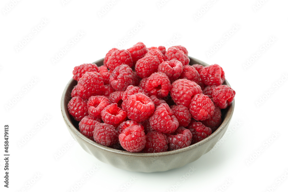 Red juicy raspberries in bowl, isolated on white background Red juicy raspberries in bowl, isolated on white background