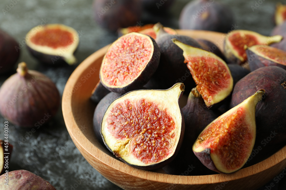 Bowl with fig on black smokey background Bowl with fig on black smokey background
