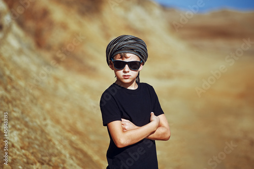 Portrait of a boy on a hot day on a walking country walk © fisher05