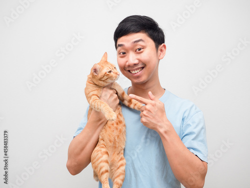 Cheerful man holding lovely cat happy smile white background