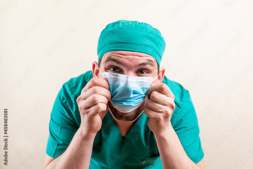 Funny doctor in a cap and a medical mask. Funny doctor in a cap and a medical mask.