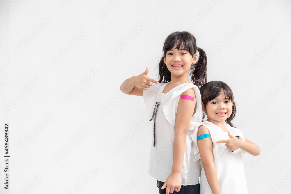 Asian Little girl Feel Good After Received a Vaccine. Asian Little girl Feel Good After Received a Vaccine.